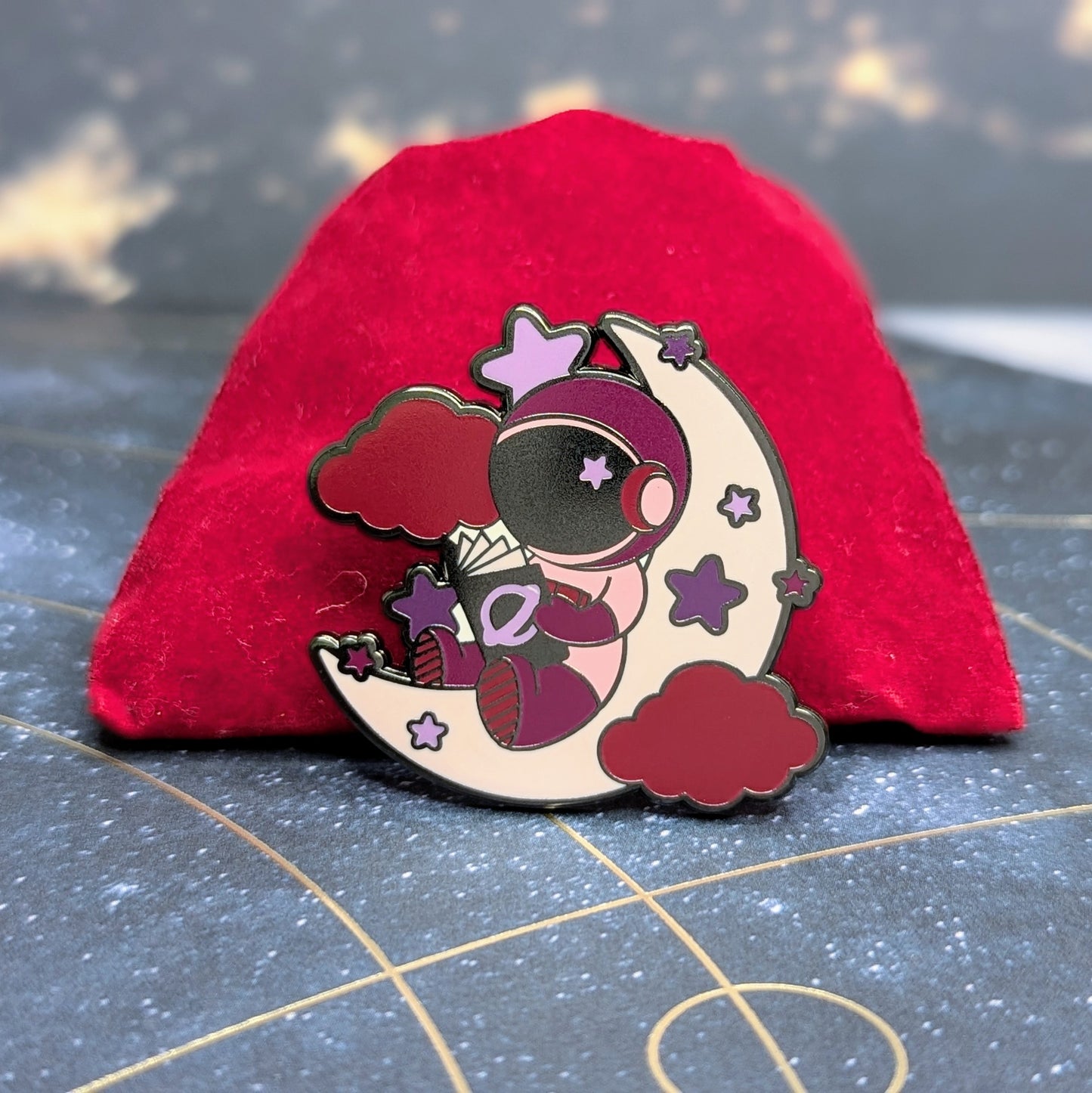 transcend space pins astronaut reading a book